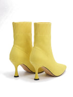 Paar Damen Sock Boots in Gelb, Ansicht von hinten schräg